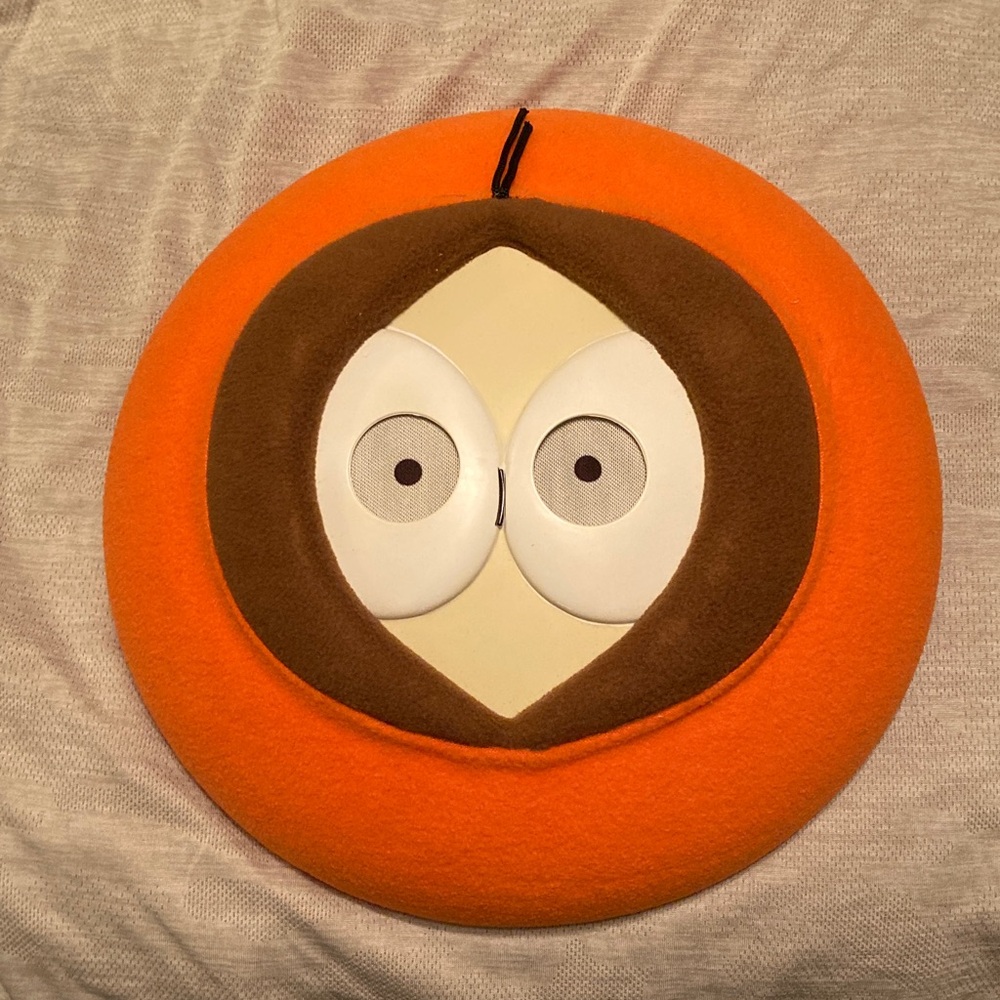 Vibrant Orange and Brown Character Cushion